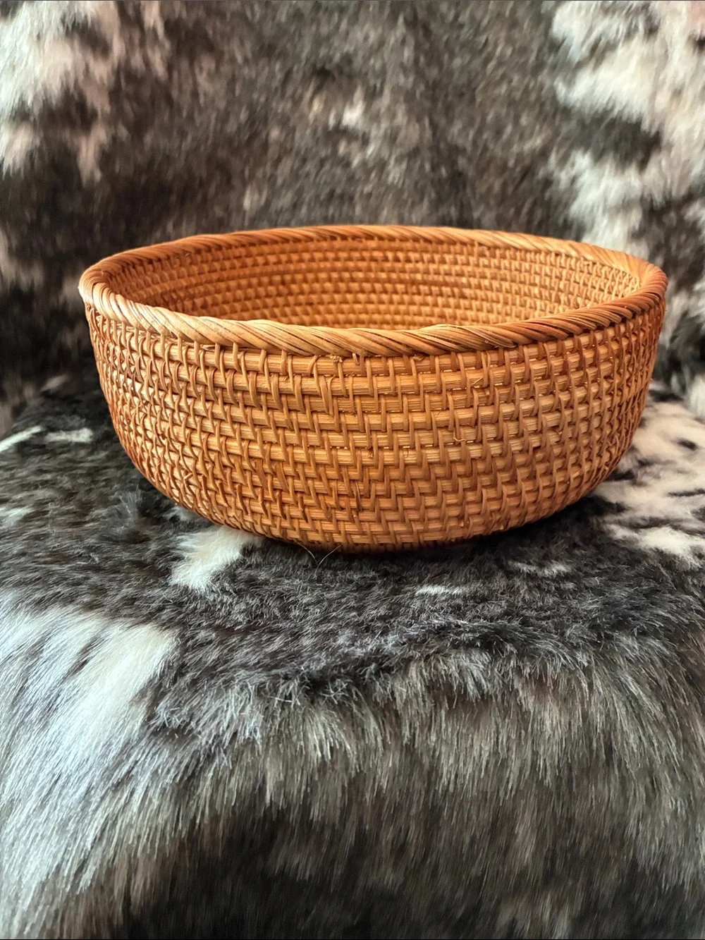 Hand-woven, round Rattan basket
